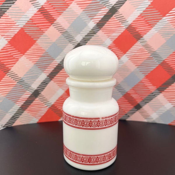 Small vintage Belgian milk glass apothecary spice jar bubble top red pattern