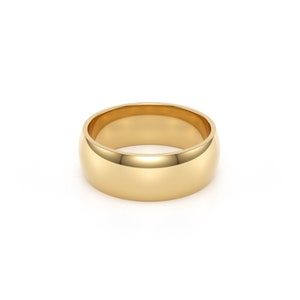 7mm 14k yellow solid gold classic dome comfort fit wedding band.