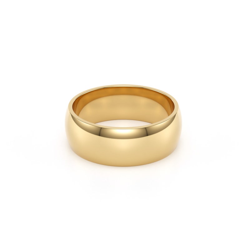 7mm 14k yellow solid gold classic dome comfort fit wedding band.