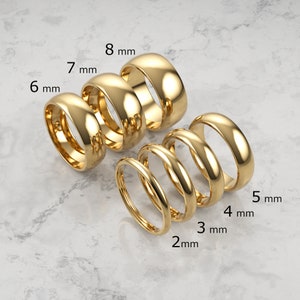 2mm, 3mm, 4mm,5mm, 6mm, 7mm, 8mm 14k yellow solid gold classic dome comfort fit wedding band.