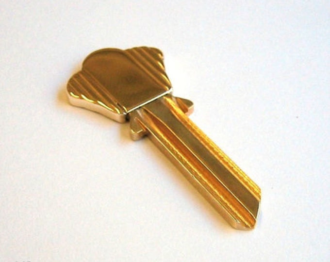 10K Yellow Gold and  Brass, Blank House Key...Made by ...Birks & Co.