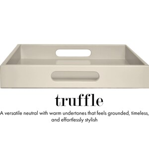 May include: A rectangular tray in a light beige truffle color with a smooth finish and cut-out handles on the sides. Below the tray, the text reads: truffle. A versatile neutral with warm undertones that feels grounded, timeless, and effortlessly stylish.
