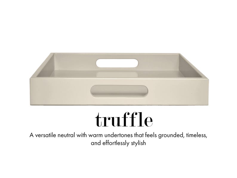 May include: A rectangular tray in a light beige truffle color with a smooth finish and cut-out handles on the sides. Below the tray, the text reads: truffle. A versatile neutral with warm undertones that feels grounded, timeless, and effortlessly stylish.