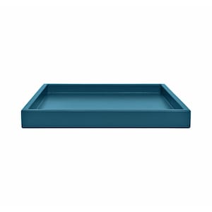 May include: A square, teal-colored tray with a raised edge. The tray is a solid color and appears to be made of a smooth material. The tray is designed to hold items and is suitable for home decor.