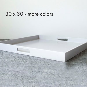 May include: White serving tray with two handles. The tray is 30 inches by 30 inches. 30 x 30 - more colors