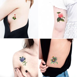 botanical feminine tattoo