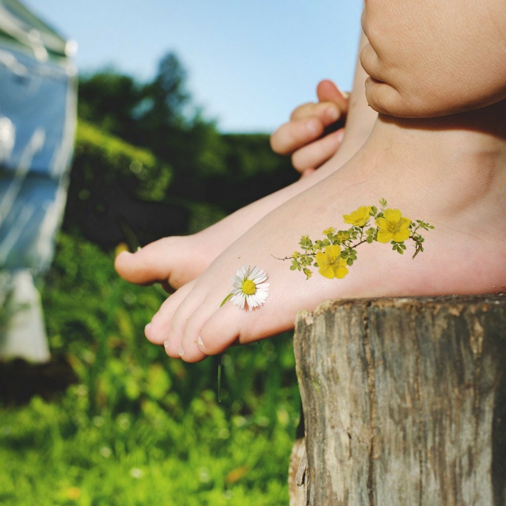 Stick and Poke Tattoo — Minimalist hand poked baby lotus flower tattoo on...