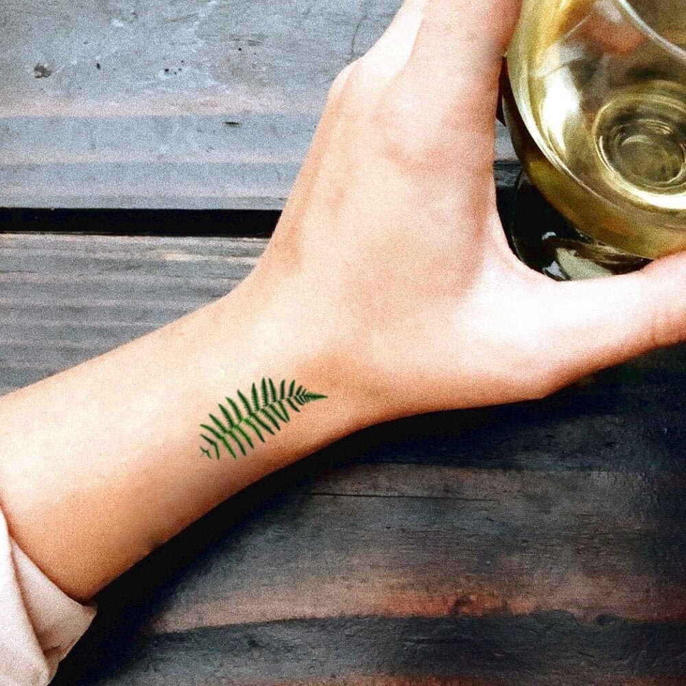 40 Beautiful Fern Frond Tattoo Designs  TattooBlend