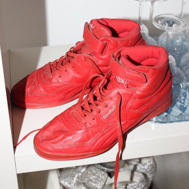 red high top trainers