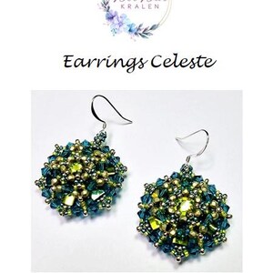 May include: A pair of Celeste earrings. The earrings are made of small, colourful beads in shades of teal, gold, and green. The earrings have a round shape and are suspended from silver hooks. The text "Earrings Celeste" is above the earrings.