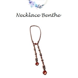 May include: A brown beaded necklace with red accents and a pendant. The necklace is labeled "Necklace Benthe" with the WirWar Kralen logo at the top. The design features a Y-shaped drop.