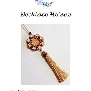 May include: A necklace with a peach-colored beaded pendant and a gold tassel. The pendant is surrounded by smaller brown beads. The necklace is called "Necklace Helene" and is from the brand "Wir War Kralen".