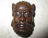 Carved Wood Netsuke - Rare and Unusual Signed Cameo style image of teak or mahagony Bearded helmet wearing samurai head