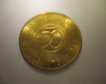 GM 1st 50 Million Cars Souvenier Brass Coin - 1954  -  Body by Fisher 1908-1954 - Great condition - unusual form - classic car lover must