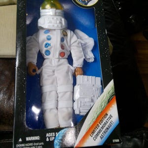 Apollo 13 Astronaut Movie Commemorative (1995 Kenner) - new in box condition - 11" doll w outfit, helmet, backpack, boots and gloves.