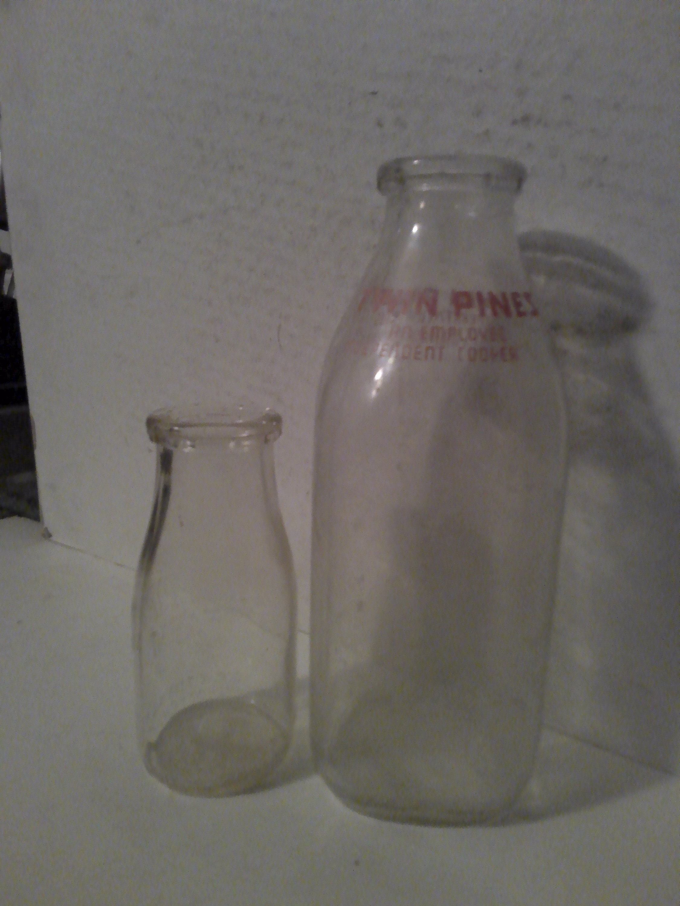 Twin Pines Dairy of Michigan Milk Bottles - relief 1/2 Pint 2.5" x 5.5" and printed Quart form w text on 2 siders of collar 8.5" x 3.25" sq.