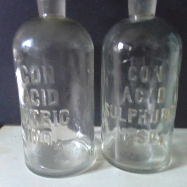 Antique Acid Bottles - two 20 oz relief glass bottles w stoppers for concentrated Nitric and Sulphuric acids- by TCW - fun decanters/props