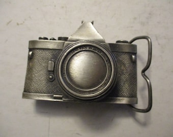 Camera shaped 1979 Bergamot model m-85 Solid Brass - Classic Nikon/Canon SLR relief form in silver finished brass - 3.25" long 2.5" high