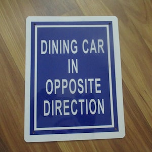 Dining Car In Opposite Direction- 7.75&quot; x 6&quot; wall and door sign for passenger on the railway.