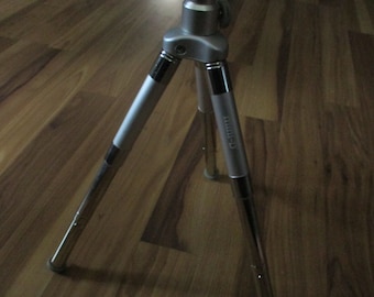 Mini-D collapsing tripod - silver and black form 11.5" high fully extended. adjustable tilt head