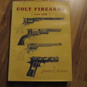 May include: A yellow book titled "Colt Firearms from 1836" by James E. Serven. The book cover features illustrations of four different Colt firearms.