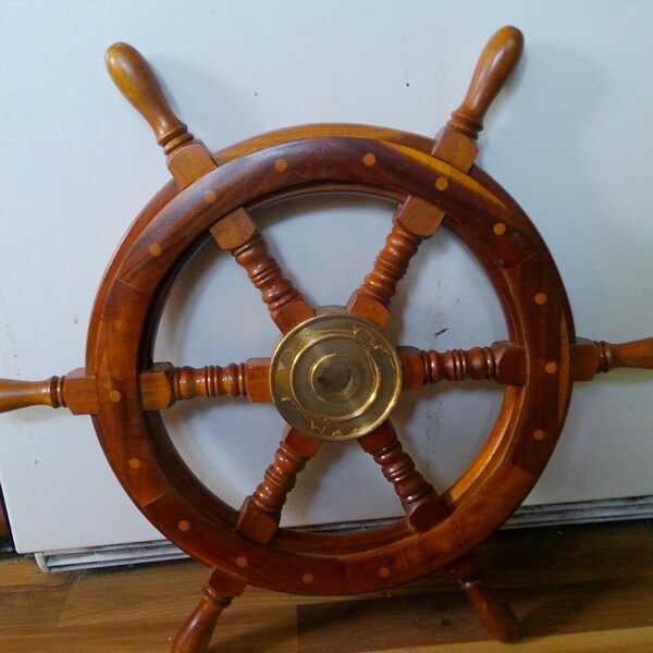 Ships Wheel of wood w brass center - nautical decor ashore or afloat - 24" diam. x 2" deep across 6 spokes - brass hub w round ctr