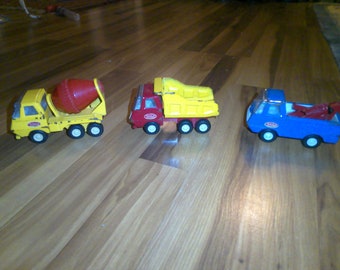 Tonka Trucks - set of 3 - Dump, Cement and Tow trucks -each approx. 5" x 2" x 2.5" high - fun functional toys w good paint and windshields
