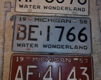 Michigan License Plate -set of 3 - 1957-58-59 - very nice condition in assorted colors