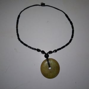 Chinese Bi Disc - antique etched jade disc w beaded necklace - 2.25" diam x 1/4" thick w 11" necklace sides and knotted clasp