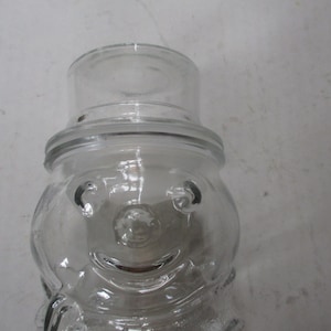 Snowman shaped clear glass bottle - 1990s 20 ounce form 7.5&quot; high at rim of glass - fun storage and decor item.