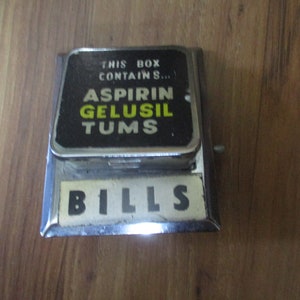 Paper Clip Pillbox for Bills - Stainless steel Paper Clip w small pill storage box - Stylish modern form for home or office desk or wall