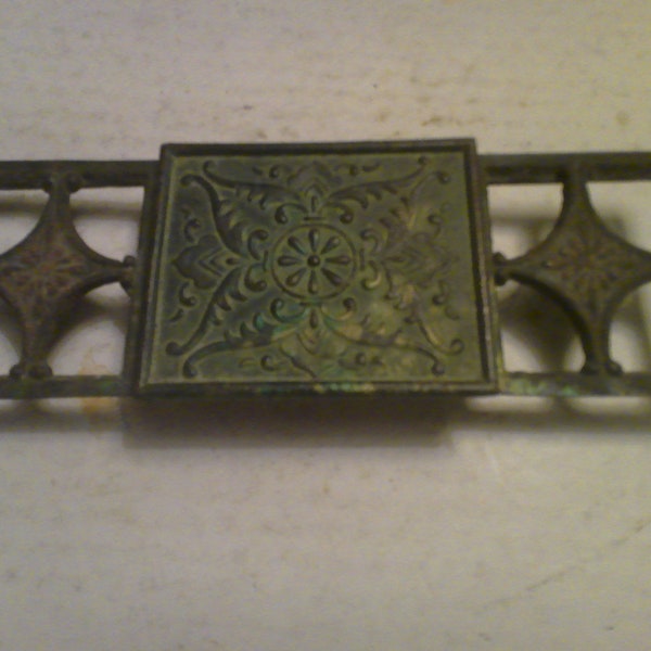 Cast iron trinket or cigarette box - 8.75" x 3" x 1.25" - w lid and large fretwork handles - Asian floral motif relief lid