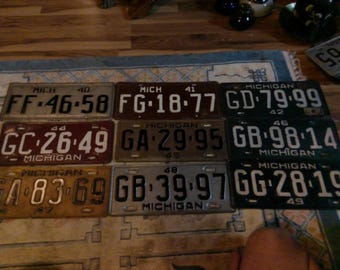 Michigan License Plates  - 1940-49 (9 plates total inc. 42 w 43 tag) Very rare 0 piece set for historical decor