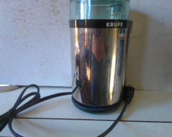 Krups 408 coffee grinder 7" high 4.5" oblong 2 piece form in excellent working condition - stylish modern reflective finish for any kitchen