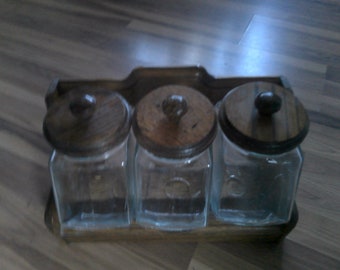 Canister Set - 3 tilt glass jars (90 oz) and Oak wood rack and lids - 8" x 8" x 4" jars w plastic seal on lids-Rack is 15.5" x 8" x 9"