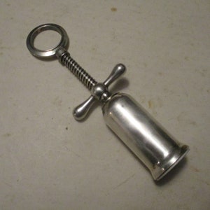 Brass Corkscrew - Silver finished modern twist pull Ankh or Ring shaped form 7.5" high x 2.25" across screw arms