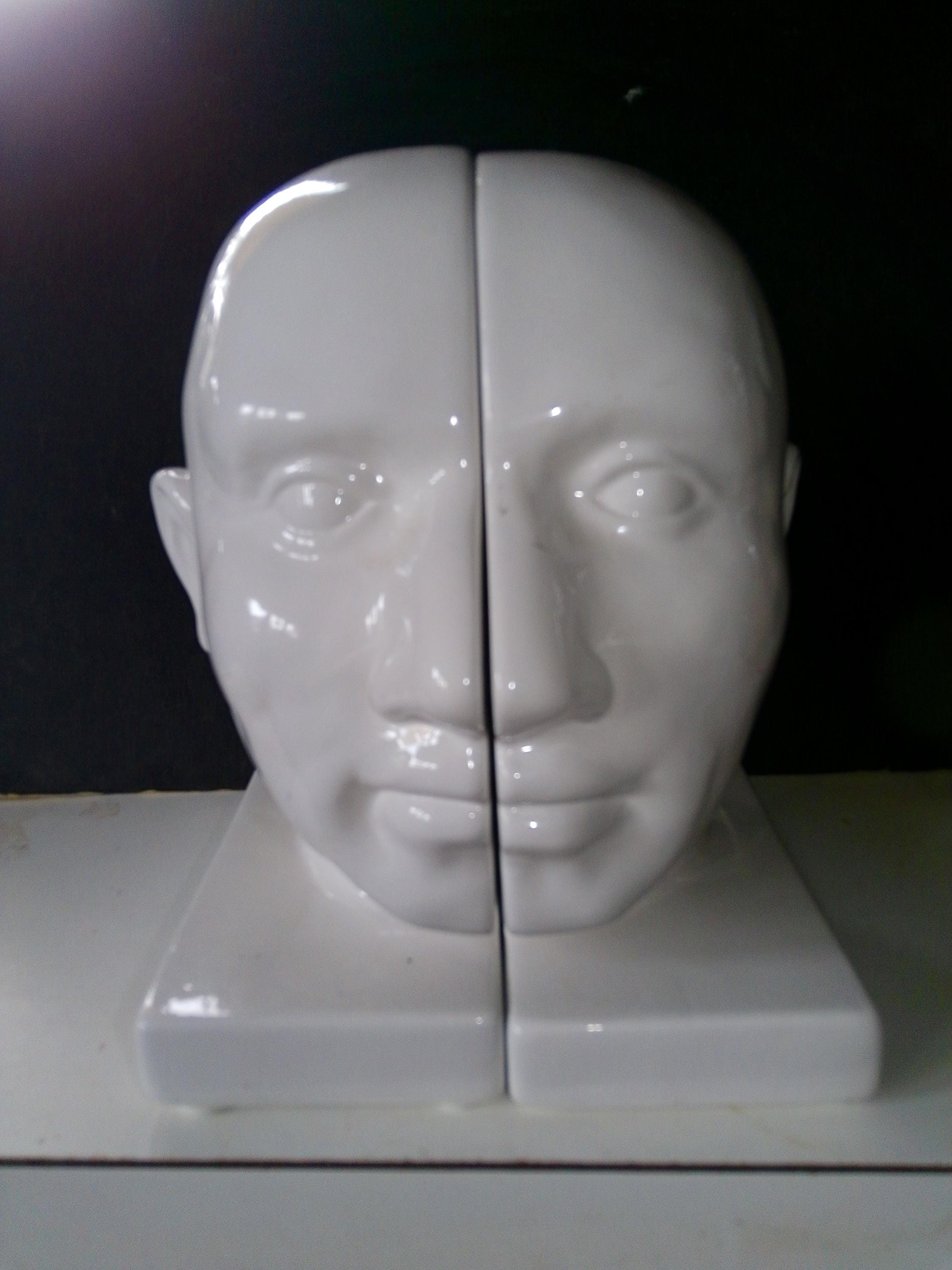 MCM Porcelain Head Bookends - fun functional split head set in vibrant white glaze - No wear or age of note