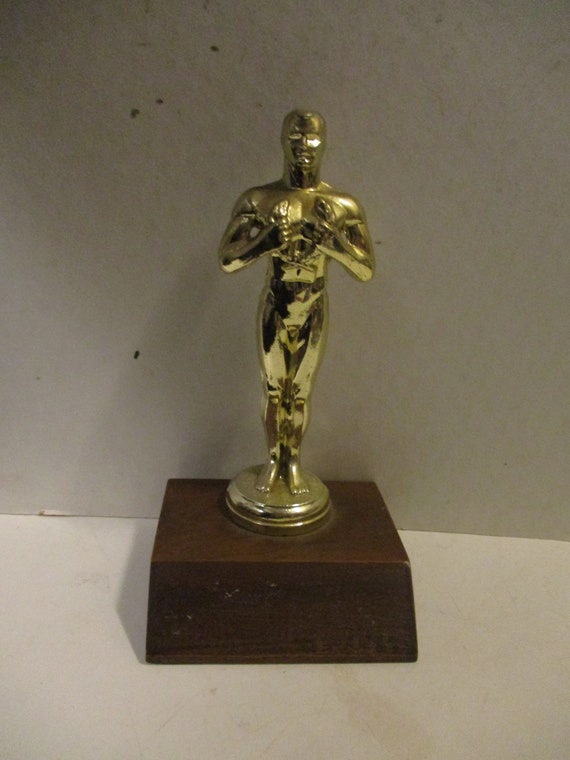 Oscar Style Statuette Trophy Award solid Brass Figure Holding Laurel Wreath  on Wood Base 7 Tall on 3.5 X 3.25 Base -  Singapore
