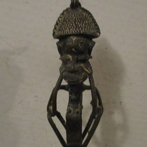 Antique Nigerian or Benin Bronze Wand - 12&quot; figural form of chief or god resting head on hands and elbows on knees - rare and unusual