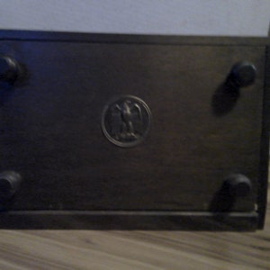 Candle Box - standing or wall mounted form with removable 4 knob slant front panel w brass eagle to reveal interior w removable shelf -