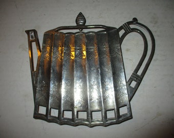 Godinger Teapot Trivet - fun functional 1990s silverplate display and serving trivet in shape of Victorian tea pot - 7.5" x 8.5" x .5" deep