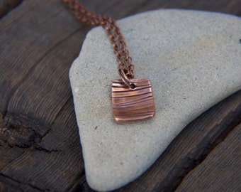 Recycled copper hand stamped pendant Rail necklace