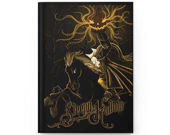 May include: Black journal featuring a gold illustration of the Headless Horseman from Sleepy Hollow. The image shows the horseman riding a horse with a jack-o'-lantern head. The words "Sleepy Hollow" are written in gold script.