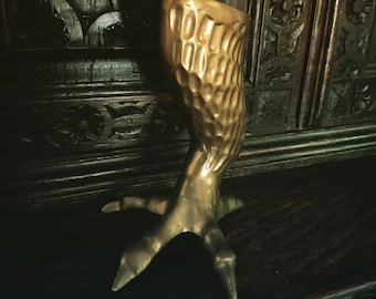 Rare and highly sought aftet antique mid-century heavy brass talon candle holder. Strong Baba Yaga vibes on this one.