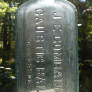 SUNROOM DECORATOR BOTTLE- Quack Medicine-J.E. Gombault&#39;s  Caustic Balsam-1910s-Sea Foam Green
