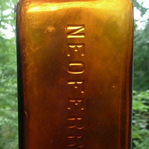 AMBER MEDICINE BOTTLE-Neoferrum-Early Iron / Vitamin Supplement -Orange Amber--c.1890s