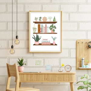May include: A framed illustration of a bookshelf with plants and books. The bookshelf has two shelves and is filled with various plants, including a hanging plant, a potted succulent, and a potted fern. The books on the shelf include titles like "The Time Traveler's Wife" and "Catching Fire".