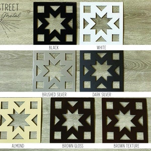 Puede incluir: Arte mural de metal en varios colores, incluyendo negro, blanco, plata cepillada, plata oscura, almendra, marr&oacute;n brillante y textura marr&oacute;n. Cada pieza presenta un dise&ntilde;o de estrella dentro de un marco cuadrado. El logotipo "Main Street Custom Metal" est&aacute; en la esquina superior izquierda.
