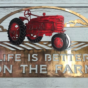 Life is better on the farm custom metal sign featuring red tractor, farm sign
