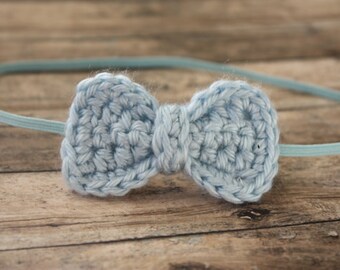 crochet bow on skinny elastic-light blue-newborn to adult